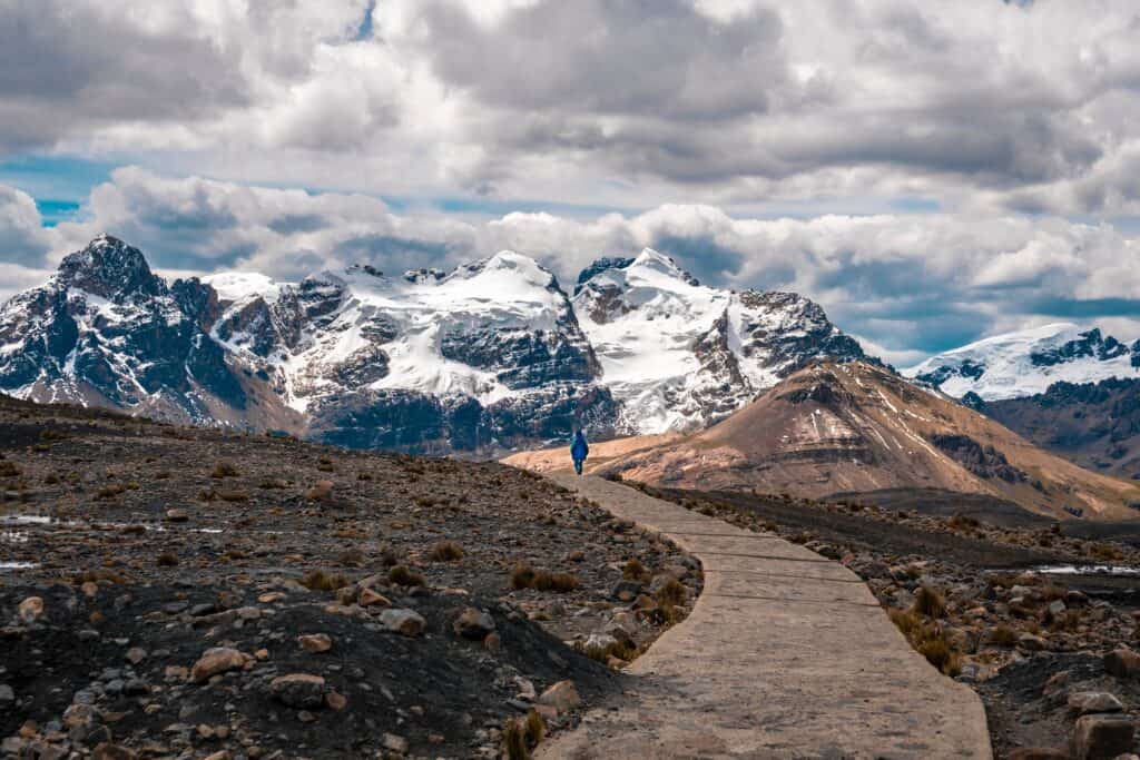 man walking in the spirit on a path of praise in mountains