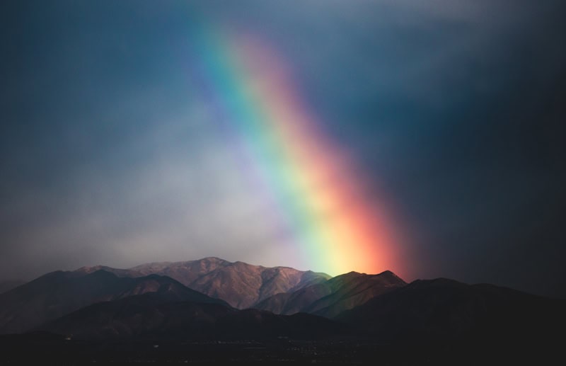 rainbow over a valley